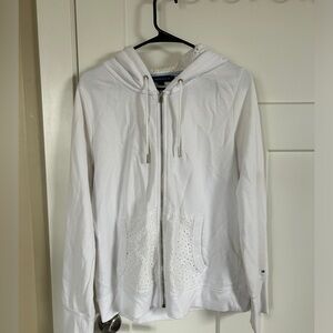 White Tommy Hilfiger jacket with eyelet details. Some stains